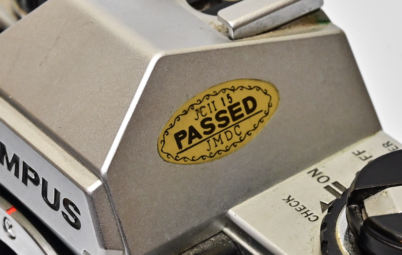 JCII sticker on an Olympus OM10